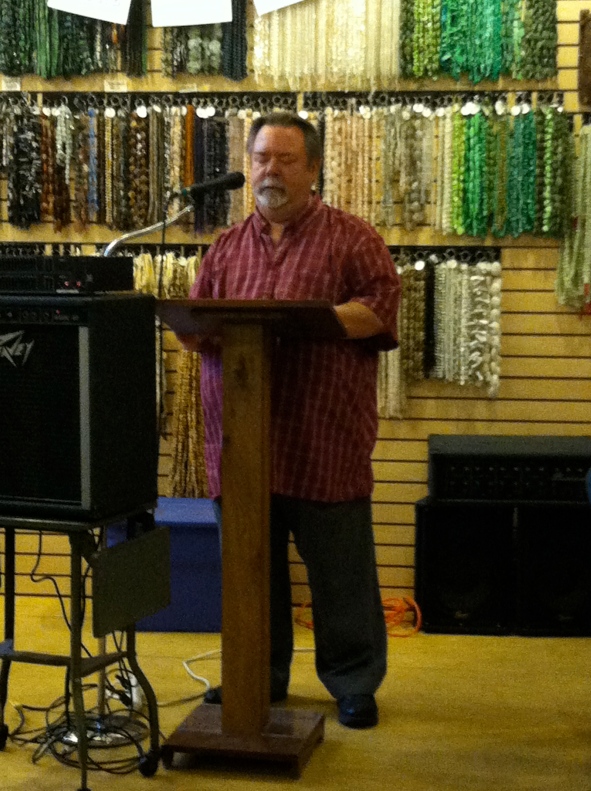 Michael Albright reading at Biddle's Escape. His poetry can be found in Issue 2 and 3.