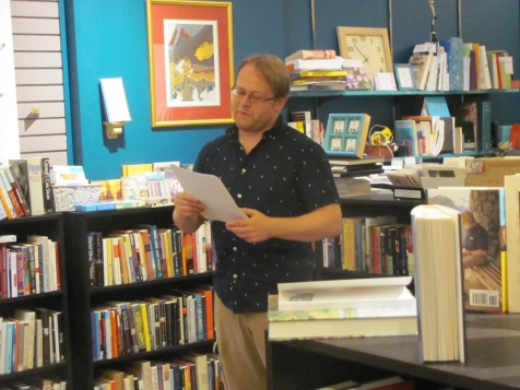 Jason Peck reading his fiction at Classic Lines Bookstore. You can read his fiction in Issue 5.